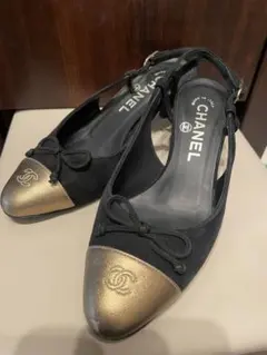 CHANEL ゴールド×ブラック リボンストラップシューズ - メルカリ