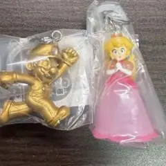 スーパーマリオ めじるしアクセサリー2 ゴールドマリオ ピーチ 2点セット