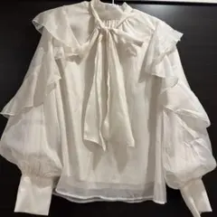 NGNI 袖フリルラメシアーブラウス アイボリー フリル リボンタイ ブラウス