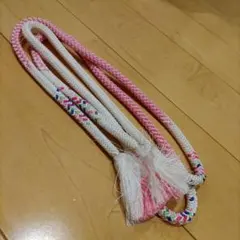 白とピンクの編み込み帯締め
