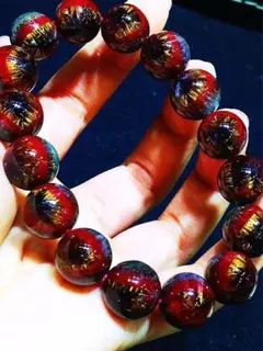 深紅の炎を宿す ― ファイヤークォーツブレスレット - メルカリ