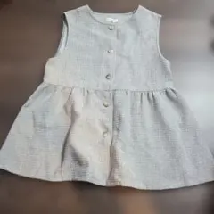 Té chichi テラス グレー ペプラムジレ