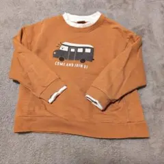 オレンジ スウェットトレーナー バスプリント