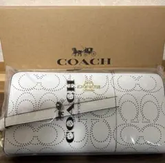【新品タグ付き】COACH パンチングホワイトシグネチャー　長財布　リストラップ 新品タグ付き】COACH パンチングホワイトシグネチャー 長財布 リスト