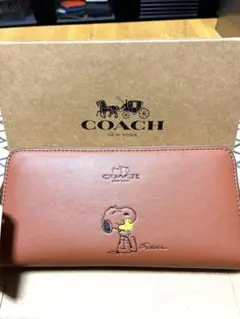 コーチCOACH長財布 ピーナッツ限定コラボ スヌーピープリント F53773