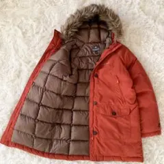 極美品 モンベル ハスキーコート ミドル丈ダウン レディースL オレンジ