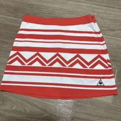le coq sportif ゴルフスカート オレンジ×白