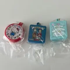 サンリオ クッキー缶チャーム シナモロール ハローキティ ザ ボードビルデュオ