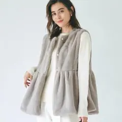 coca ファーペプラムベスト M