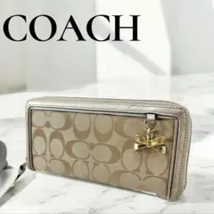 COACH ロゴ入り長財布 リボンチャーム付きのサムネイル