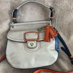 COACH コーチ 70周年限定 レザーショルダーバッグ バイカラー タッセル付