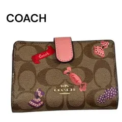 美品 COACH コーチ シグネチャー キャンディ プリント 財布 PVCレザーのサムネイル