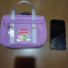 新品　未使用Care Bears 紫色ポーチ キーホルダー付き
