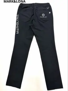 マークアンドロナ デニムパンツ スカルロゴ ネオングリーン E261311 マークアンドロナ デニムパンツ スカルロゴ ネオングリーン E261311
