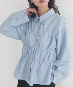 新品 LIAN シャーリングビスチェデザインシャツ ライトブルー 長袖 ブラウスのサムネイル