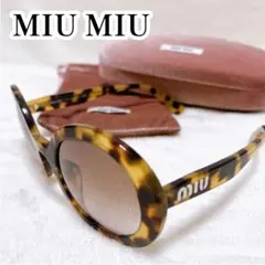MIU MIU ミュウミュウ サングラス SMU A03 ブラックゴールドロゴ