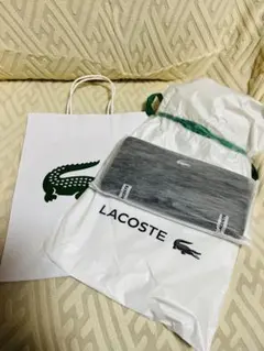 【新品】LACOSTE シャンゼリゼ ラウンドジップ レザーロングウォレットのサムネイル