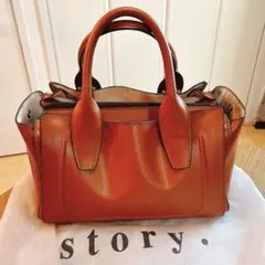 story. 本革　ブラウン　ハンドバッグ　ショルダー有り