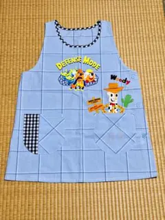 新品★トイストーリー ウッディ エプロンMLのサムネイル