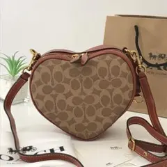 新品 COACH　クロスボディシグネチャーハートショルダーバッグ