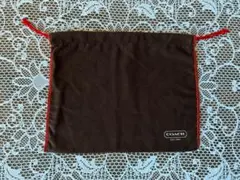 COACH ダークブラウン 巾着