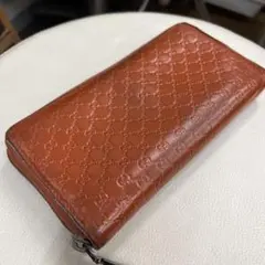 GUCCI シマ GG ロゴプレート 長財布 レザー オレンジ - メルカリ
