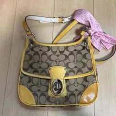 COACH コーチ シグネチャー ターンロック ショルダーバッグ 黄 13791
