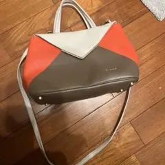 オレンジ・ブラウン・ホワイトのハンドバッグ