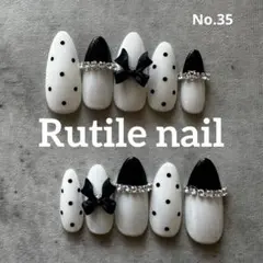 ホワイトネイル❤︎ドット　リボン　フレンチデザイン