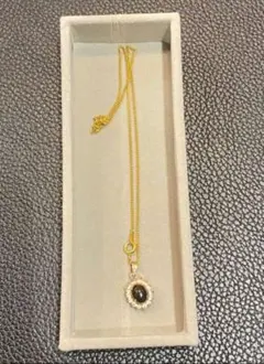 遺品整理ゴールド オーバル型ブラックストーンネックレス