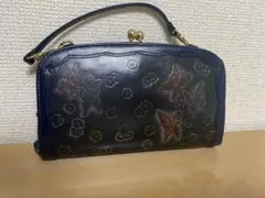 手彫り，手染め　レザー 長財布 蝶と花のデザイン