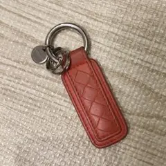 BOTTEGA VENETA オレンジレザーキーホルダー　イントレチャート