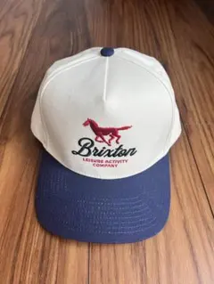 Brixton 刺繍ロゴキャップ ベージュ/ネイビー