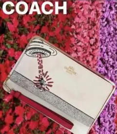 COACHストラップ付長財布ディズニーキースヘリング.コラボUFOプリント.新品