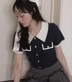 NICECLAUPバイカラーゴールドボタンポロニット 美品のサムネイル