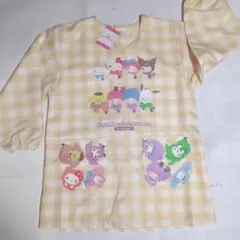 後ろボアのサンリオキャラクター 　クリーム色チェックの保育士エプロン no120
