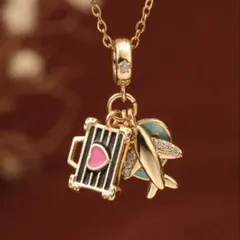 トランクケース 飛行機 地球ハートのネックレス ゴールド[新品未使用 送料込み]