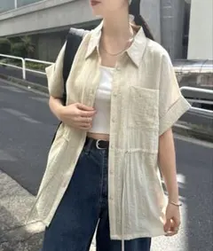 アストラット】スタンドカラーブラウス 淡いイエロー - メルカリ