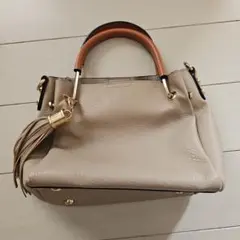 ハンドバッグ ベージュ ゴールド金具 タッセル付き