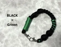 パラコード編み込みスマホストラップ 黒と緑　ハンドメイド　ハンドストラップ