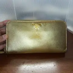PRADA プラダ 長財布 ゴールド 全体的にダメージ有 - メルカリ