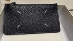 【新品】メゾンマルジェラ フラグメントケース　S56UI0143 P4455