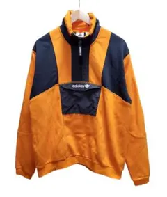 adidas アノラックハーフジップスウェット オレンジ