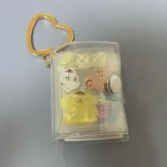 ミニシール帳完成品　おすそわけ　サンリオ　しんちゃん　ジョージ　たまごあし