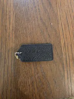 COACH（コーチ）のバッグチャーム（レザーハングタグ）
