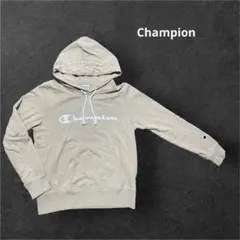 Champion ベージュ フード付きパーカー