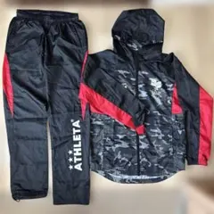 ATHLETA フード付ピステ上下セット 160cm ブラック×レッドカモフラ柄のサムネイル