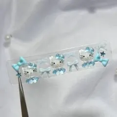 ネイルパーツ　ハローキティ　サンリオ　水色　10個＋おまけセット　デコ　アートのサムネイル