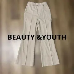 BEAUTY&YOUTHベージュセンタープレススラックス