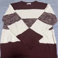 アイボリーとブラウンのニットセーター